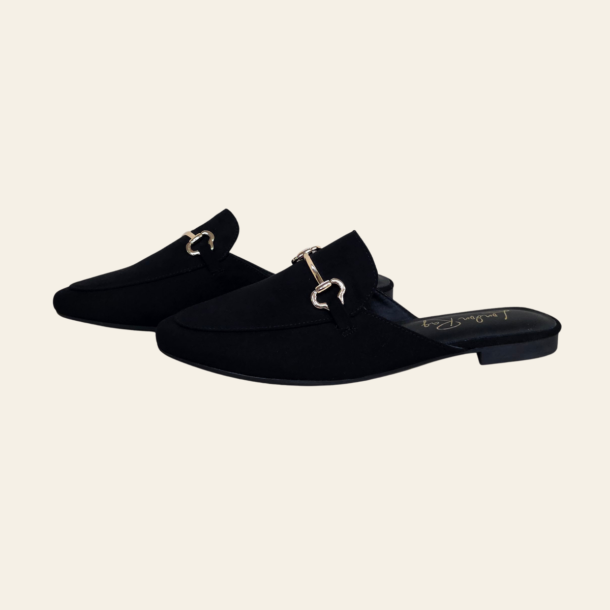 Gold-tone horsebit detail on The Alpine black suede mule