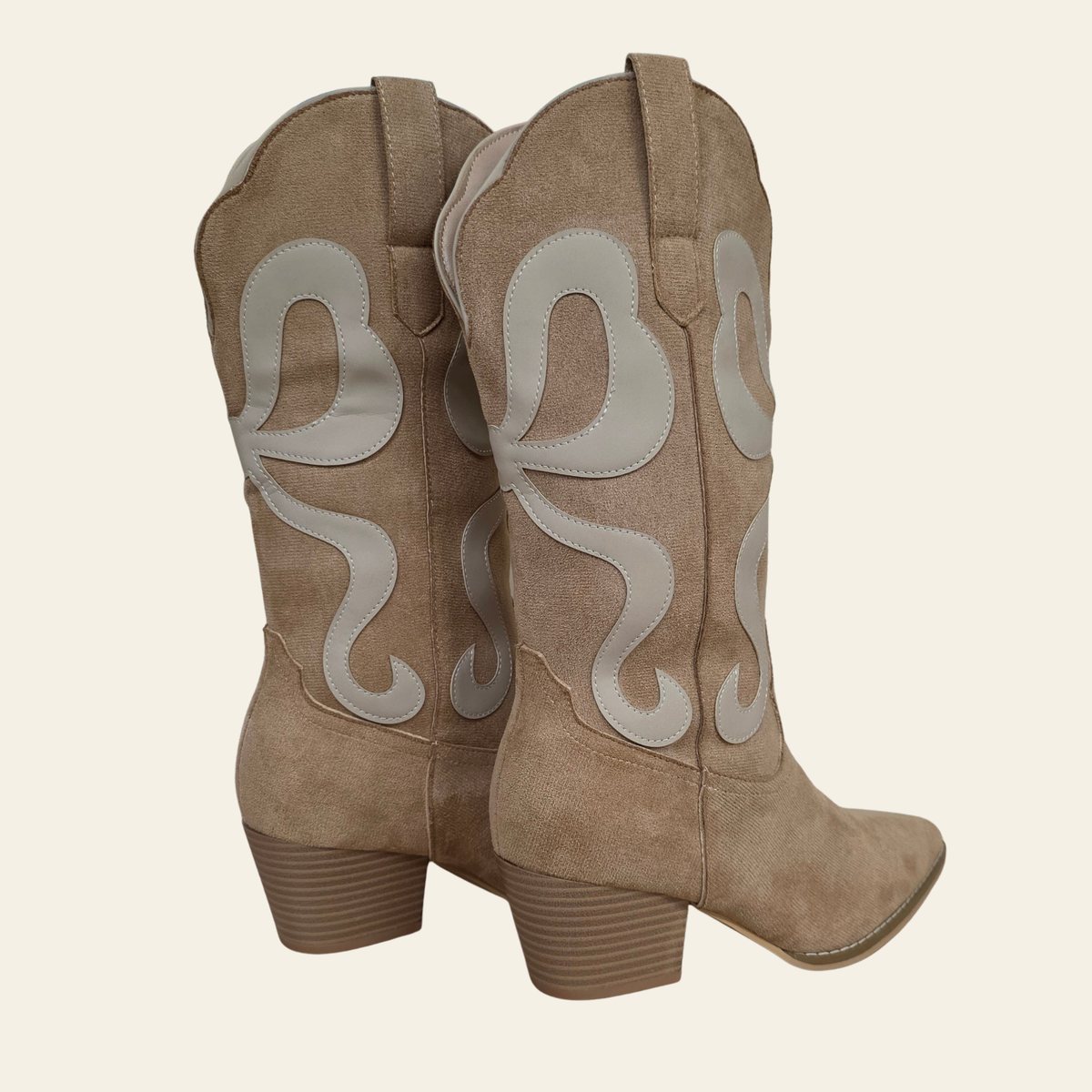 Side view of The Bowie - vegan leather faux suede cowboy boots with inlays on the shafts, pointe toe and stacked heel.