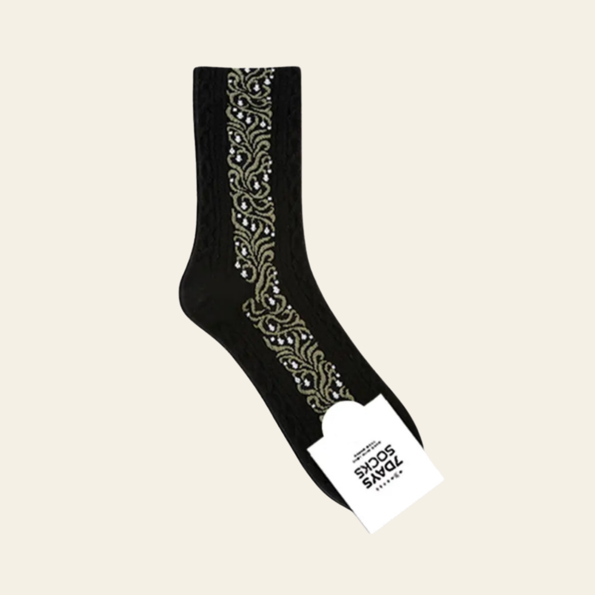 Socks featuring black cable-knit with a central vertical band of sage and creamy white floral embroidery.