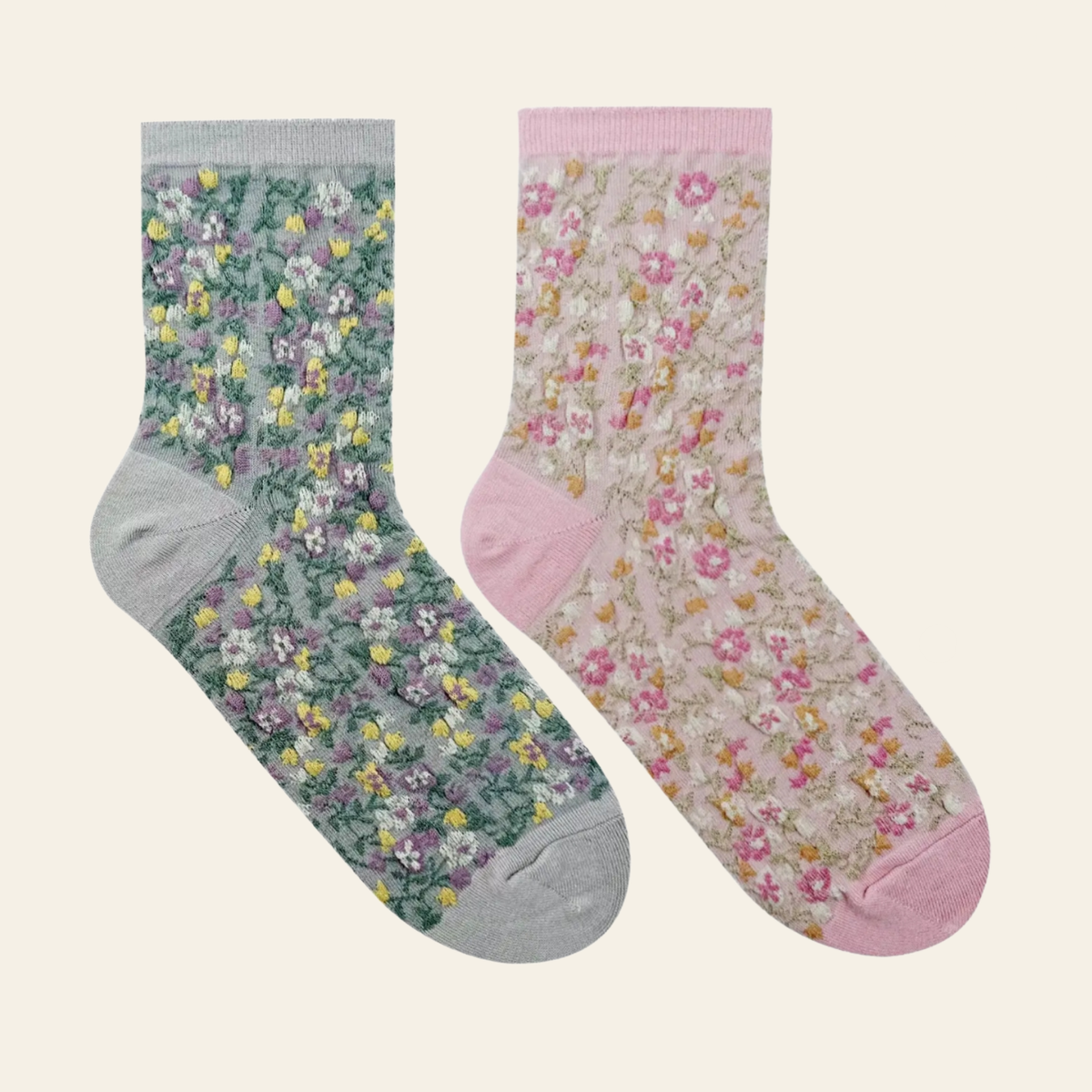 Mori Garden sock shown in two colorways - gray and pink