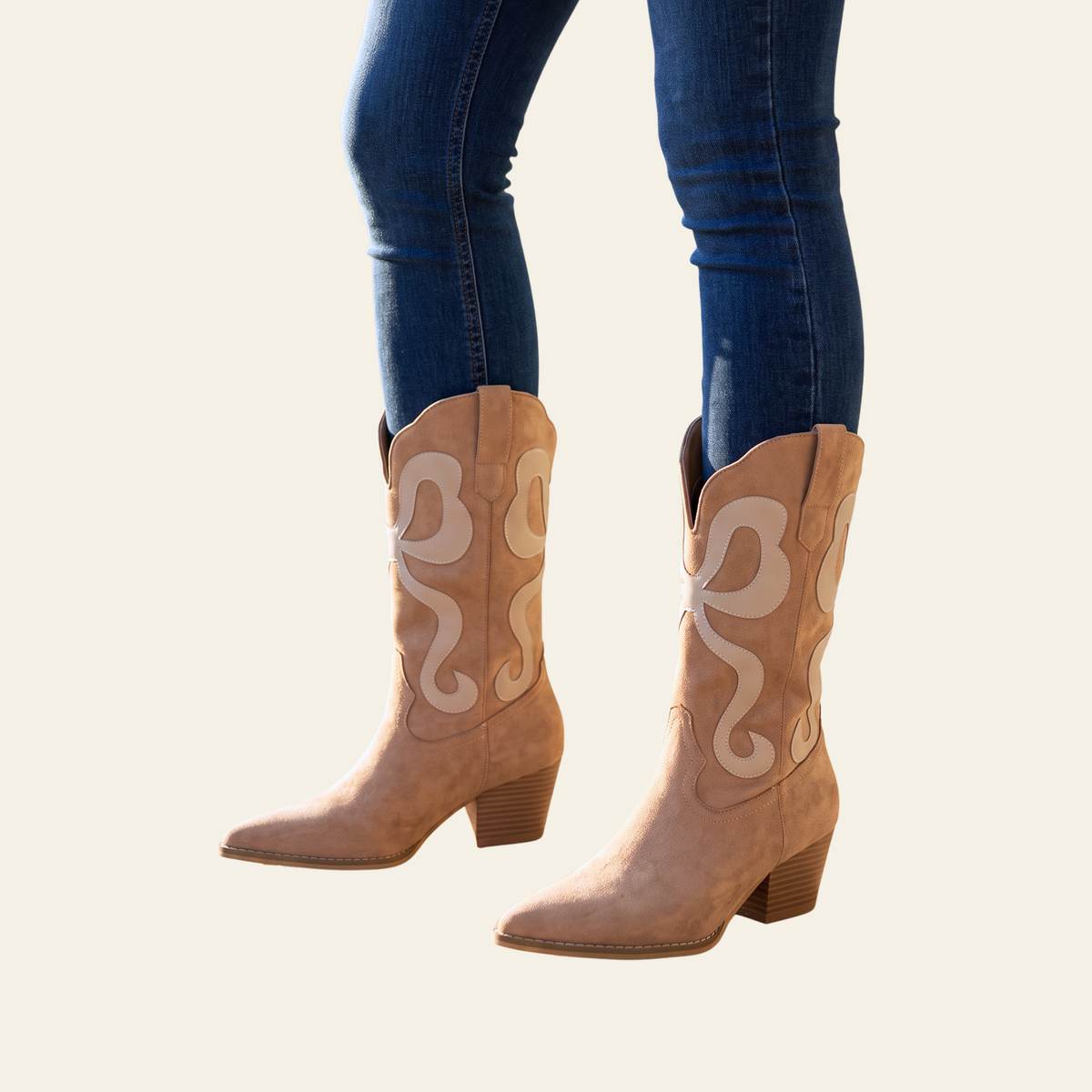 Almond suede western boots with cream inlay design and block heels, styled with dark wash jeans