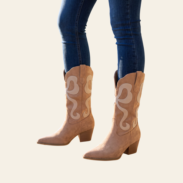Almond suede western boots with cream inlay design and block heels, styled with dark wash jeans