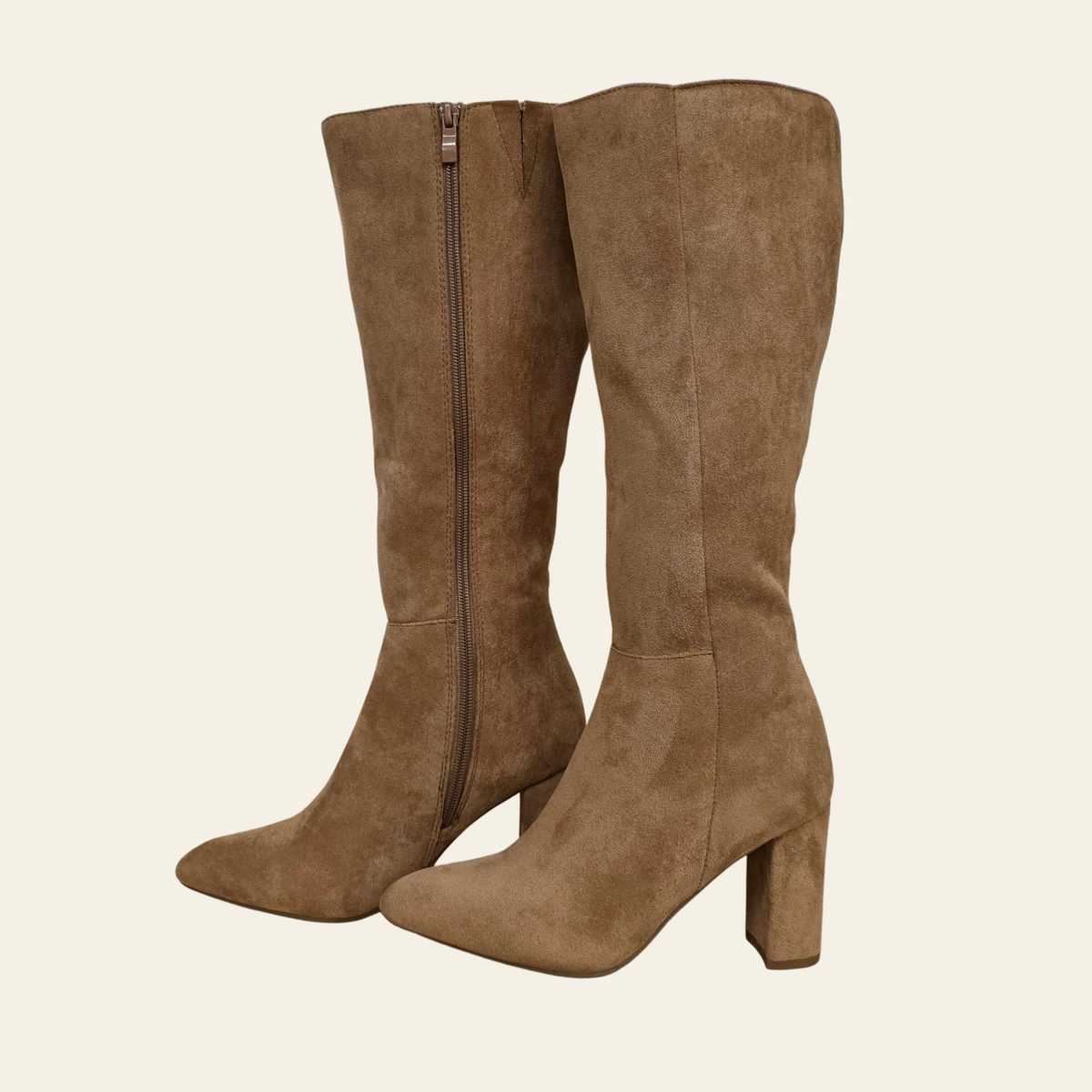 Side view of The Brazil tan knee-high block heel boot