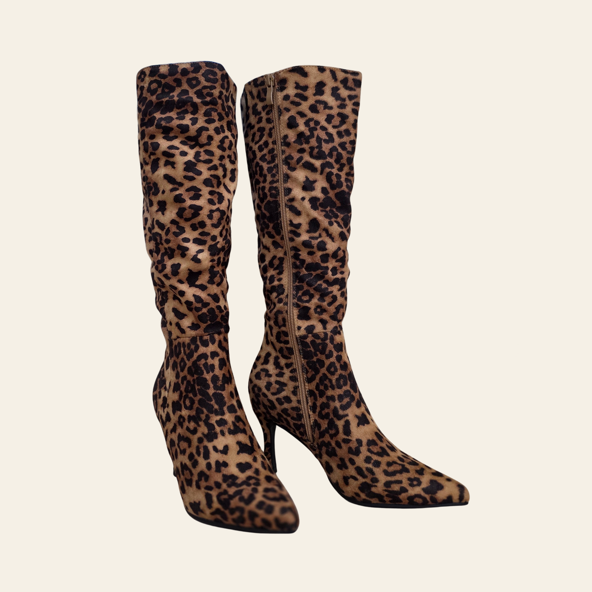 Side view of The Kaylee - a mid heel, leopard print knee-high boot