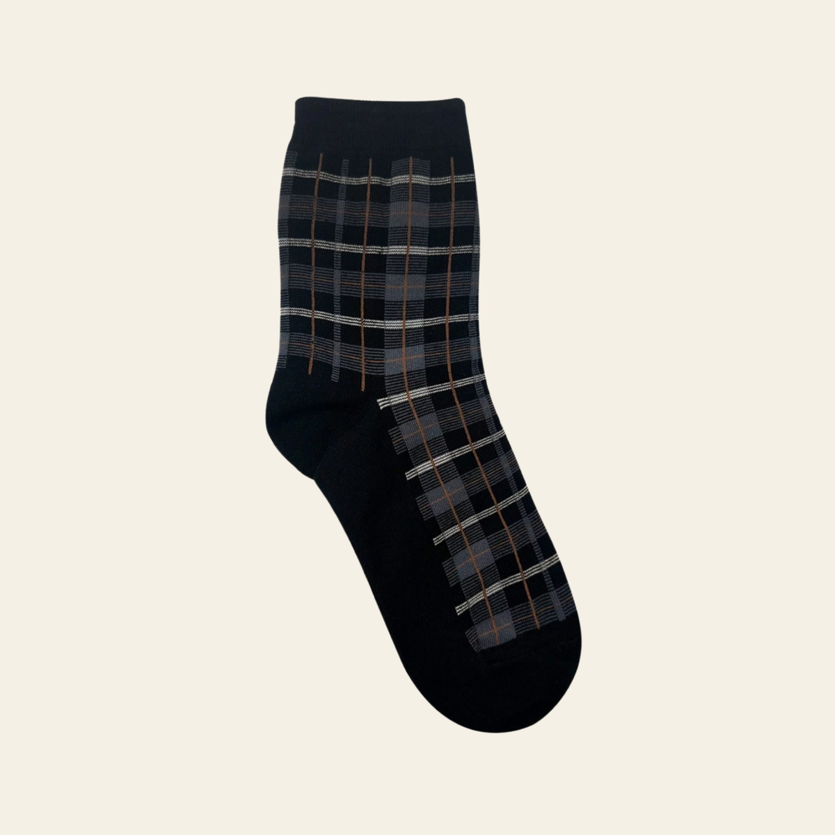 Black socks with a gray and brown plaid pattern.