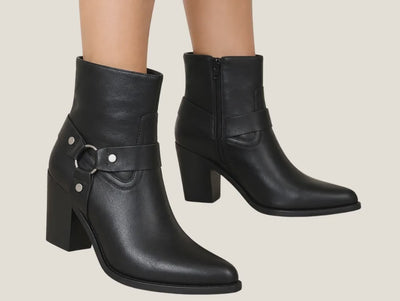 model with black moto ankle boot