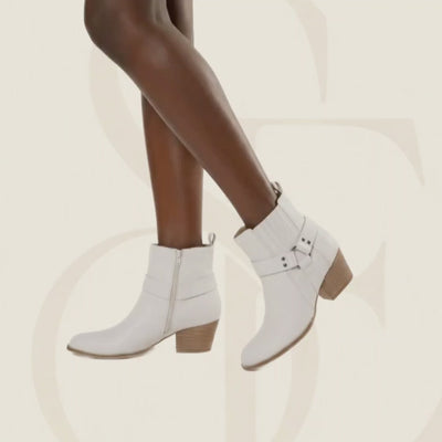 Model wearing white moto boots