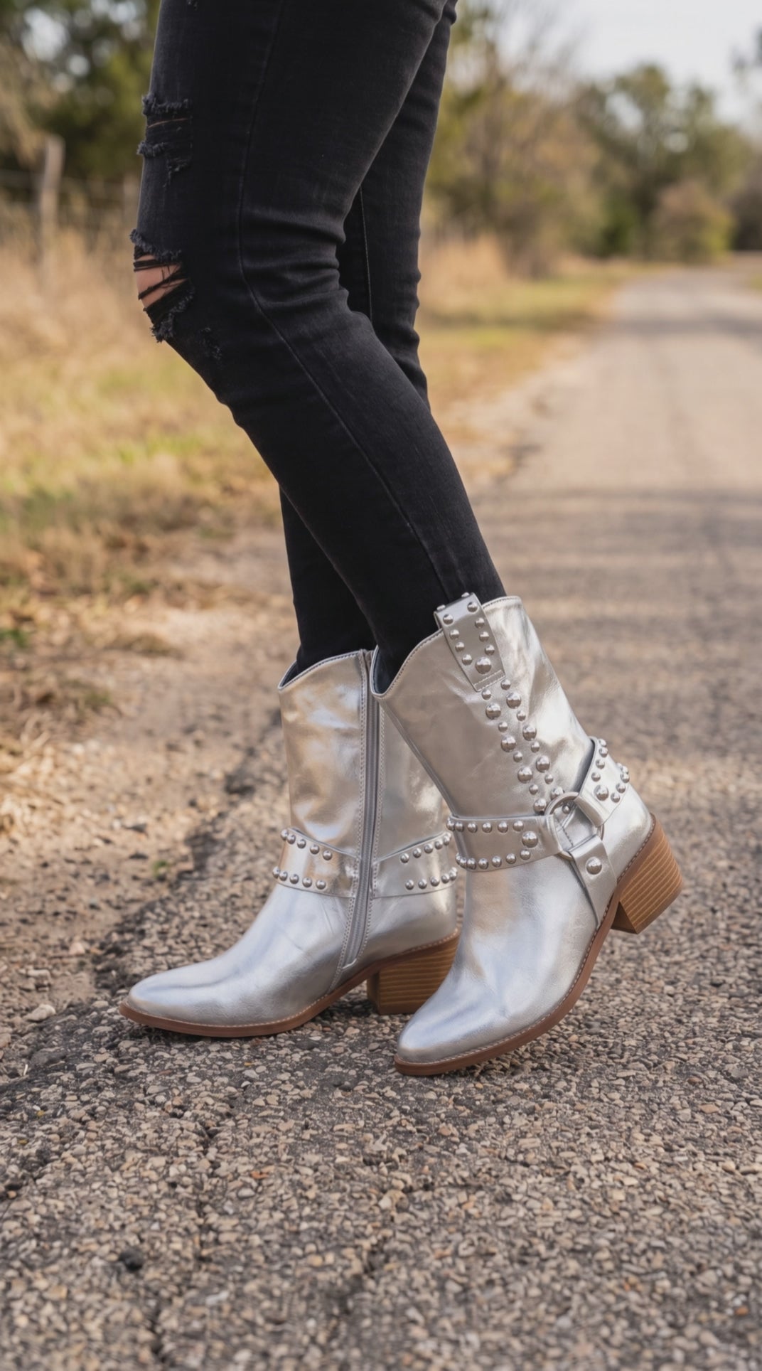 London Rage ALTAIR western boot on model. Studded in metallic silver